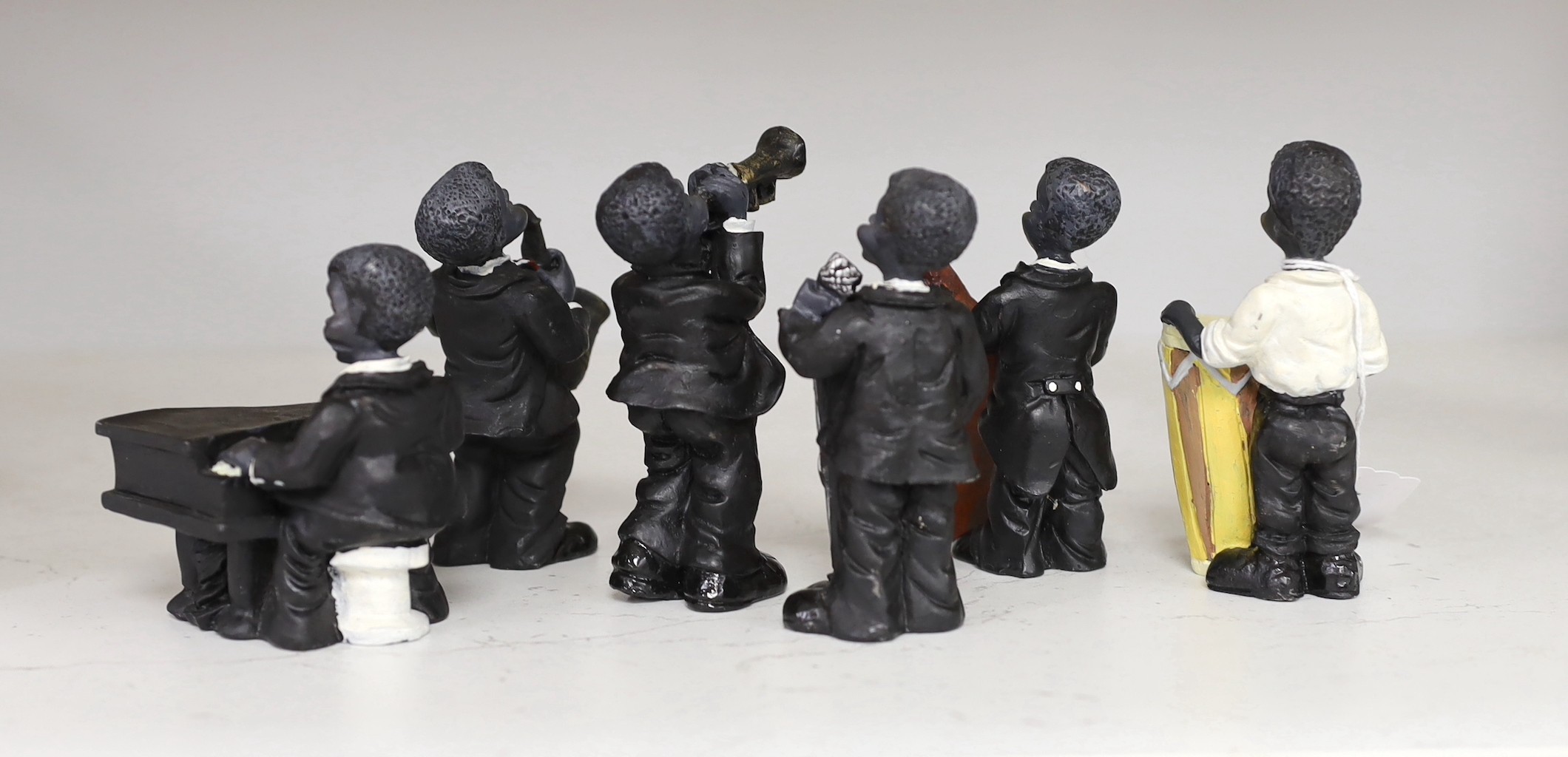 A moulded composition six-piece jazz band, 10cm tall